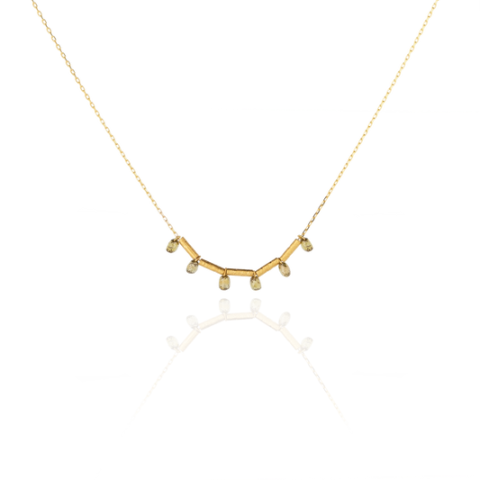 Front view of necklace AURORA in yellow gold with six green diamonds