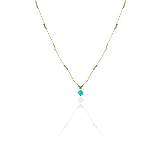 Chocker with green ribbon and 18 KT yellow gold pendant with gemstone turquoise front view