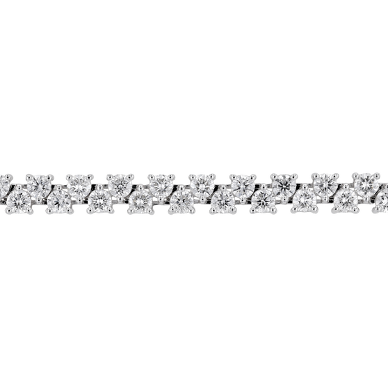 detail cutout of whitegold bracelet with white diamonds