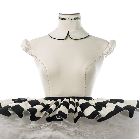 Close up of Anna Doll with black and white stripes front view