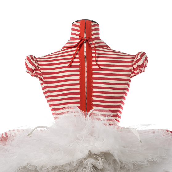 Close up of Anna Doll with red and white strips back view