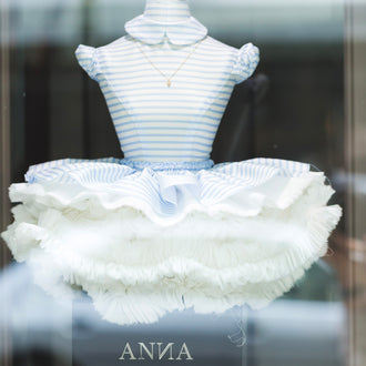 ANNA Doll number 21 in white with blue stripes front view