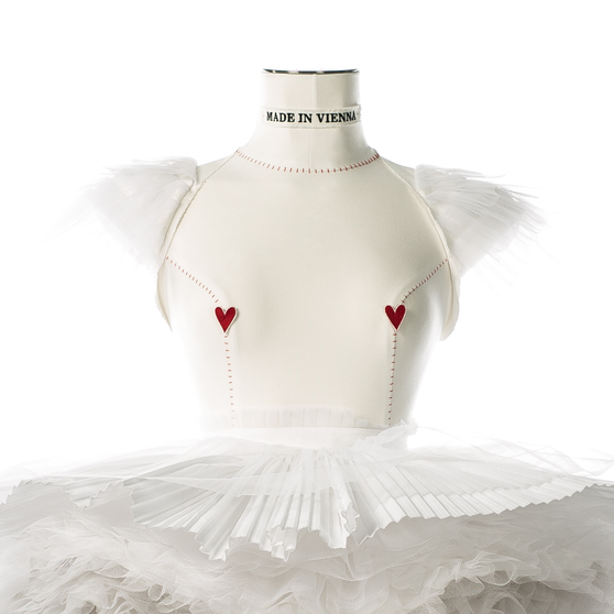 Close up of Anna Doll in white with red hearts front view