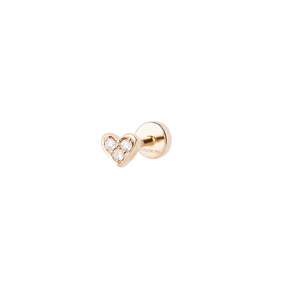 Close-up side view of a stunning 18 KT rose gold heart-shaped ear stud piercing adorned with brilliant white diamonds, showcasing exquisite craftsmanship and elegance.