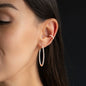hoop earring CHLOE 40mm and ear cuff CHLOE with white diamonds in 18 kt rose gold worn on womans ear