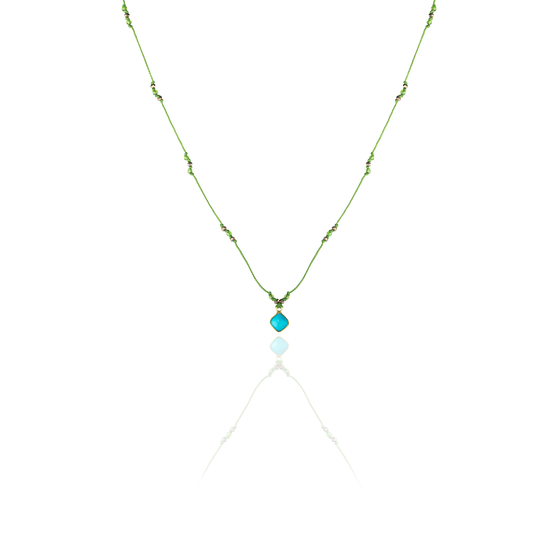 Chocker with green ribbon and 18 KT yellow gold pendant with gemstone turquoise front view