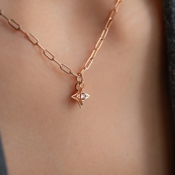 Pendant ANNA Signature Star in Rose Gold with white Diamond worn on necklace