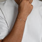 Wristband Hamsa Men in rose gold worn on man's wrist