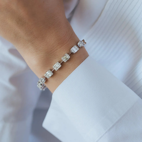woman wearing bracelet with white diamonds 