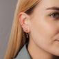 woman with ear cuff and pendant soul in rose gold and hoops in rose gold with white diamonds