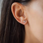 ear with white diamond earring
