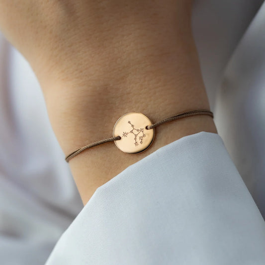 wristband Zodiac in rose gold with moon sign and ascendent in cooperation with the uranian approach on wrist close up